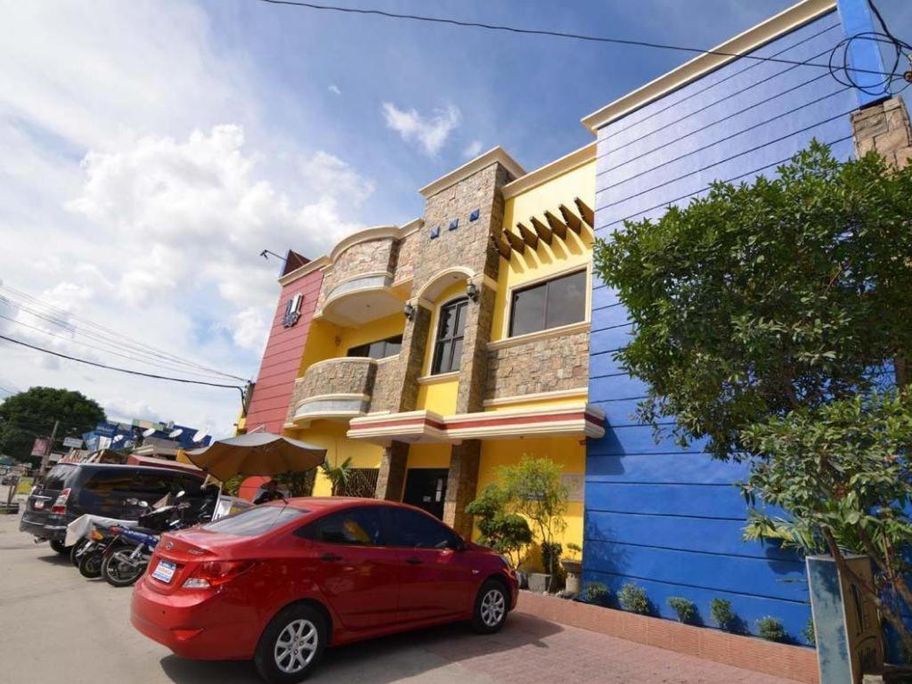 Kokomos Suites Hotel Angeles Exterior photo